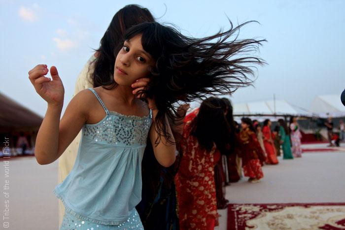 Girls-celebrating,-dancing-in-line,-flicking-hair,-Emirates,-UAE_Tribes-of-the-world_Flickr